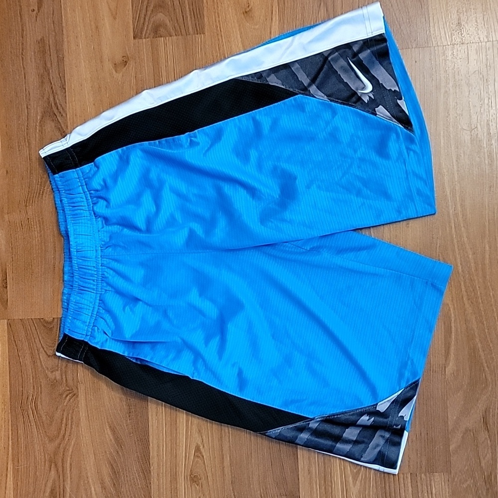 Boys Medium Nike Athletic Shorts. Blue and Black